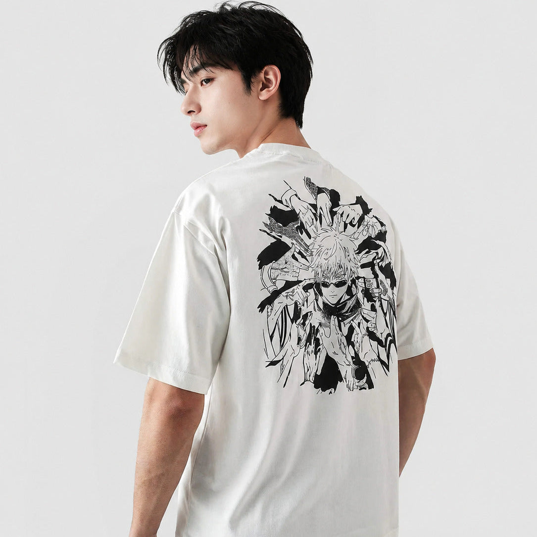 Person wearing a white t-shirt with black floral design on the back against a plain background